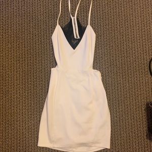 Lulu’s white bodycon dress with black lace